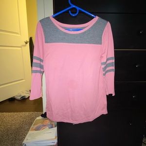 grey and pink long sleeve shirt